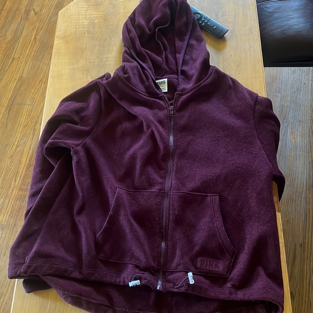 Purple Victoria’s Secret Pink zip up hoodie.